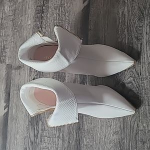 High heel boots sz 7.5. White ankle boots. Never worn.